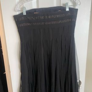 Black strapless w/built in corset. Size 10 but fits like a 6z